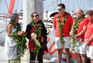 Hawaiian priest, Danny Akaka and his wife, Anna, lead Mark Richards and Roy P. Disney during the traditional Hawaiian blessing ceremony for Wild Oats XI. (Credit Doug Gifford – Ultimate Sailing)